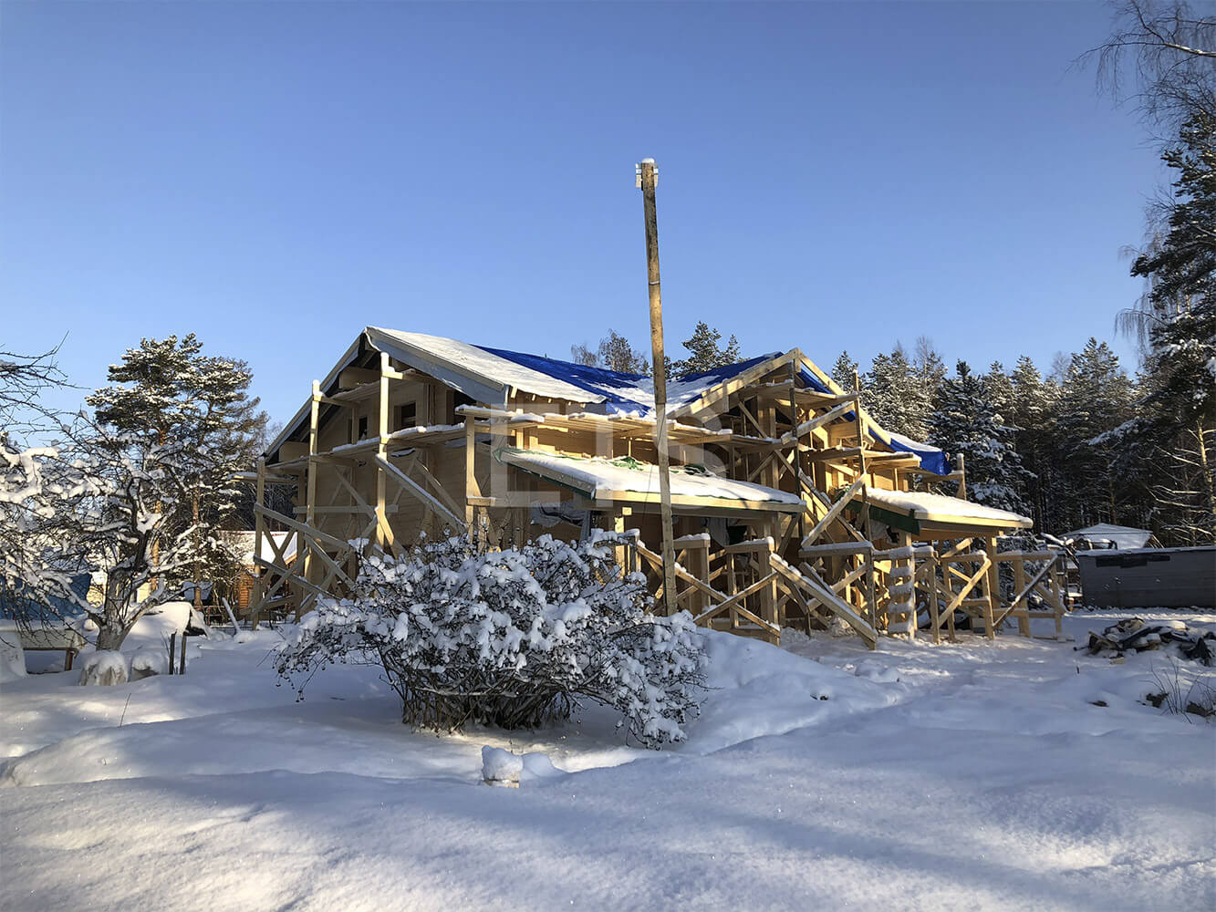 Строительство дома из клееного бруса в финском стиле, спроектированного и построенного ETS