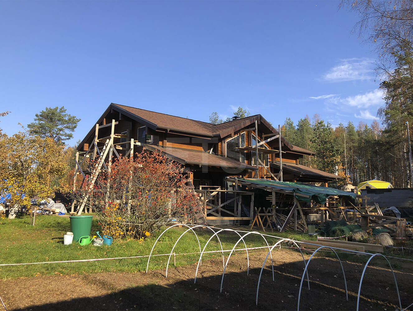 Строительство дома из клееного бруса в финском стиле, спроектированного и построенного ETS